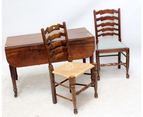 An early 19th century mahogany dining table raised on ring turned supports to brass caps and castors, formerly an extending t