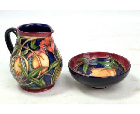 MOORCROFT; a 'Plevriana' pattern tubeline decorated jug, impressed marks and year cipher for 2004 to base, height 11.3cm, and