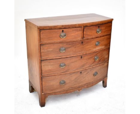 An Edwardian bowfronted chest of two short over three long drawers on bracket feet, 104 x 108cm.