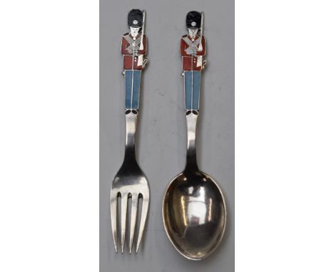Danish sterling silver novelty spoon and fork with enamelled decoration of guardsmen with bearskins, impressed Monster Beskyt