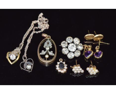 A collection of 9ct gold earrings including one pair set with a heart cut amethyst to each, two pendants and a Victorian past