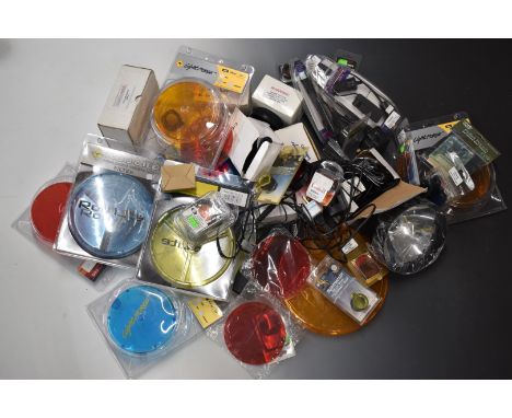 A large collection of Deben and similar of gun light and lamp accessories including dimmer switches, filters, LED ray charger