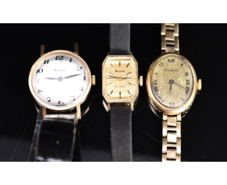 Three Accurist 9ct gold ladies wristwatches, one on yellow metal bracelet the others on black leather straps.&nbsp;