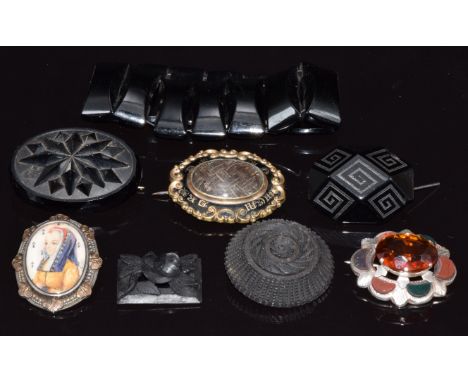 Three Victorian jet brooches, a jet bracelet, Victorian mourning brooch, silver pendant/ brooch set with a portrait miniature