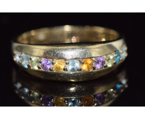 A 9ct gold ring set with a citrine, amethyst, peridot and topaz, 4g, size R/S