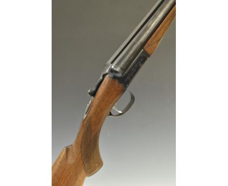 SKB Model 100 12 bore side by side shotgun with engraved lock, trigger guard, underside and top plate, chequered semi-pistol 