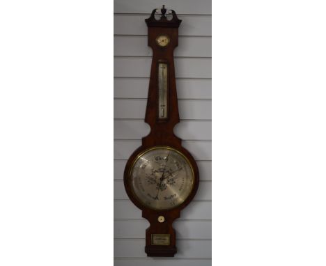 A Fagioli of London oversized mahogany barometer with silver dials, thermometer, ivory handle and urn topped moulded pediment