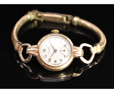 Rotary 9ct gold ladies wristwatch with subsidiary seconds dial, gold hands and Arabic numerals, silver dial and signed 15 jew