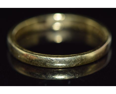 A yellow metal wedding band/ ring, 2.4g, size K