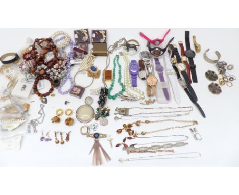 A collection of costume jewellery including watches, rings, Miracle pendants, necklace including agate, vintage brooches, Swa