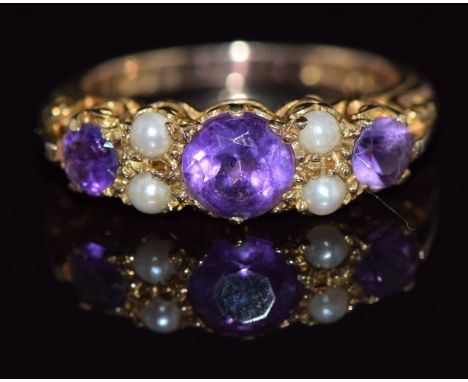 A 9ct gold ring set with an amethyst and pearls, 3.7g, size O