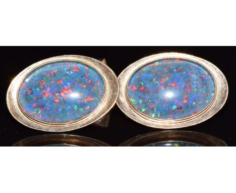 A pair of 9ct gold cufflinks set with black opal doublets, 12g&nbsp;