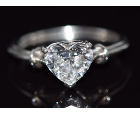 A white gold ring set with a heart cut moissanite, 3.5g, size K