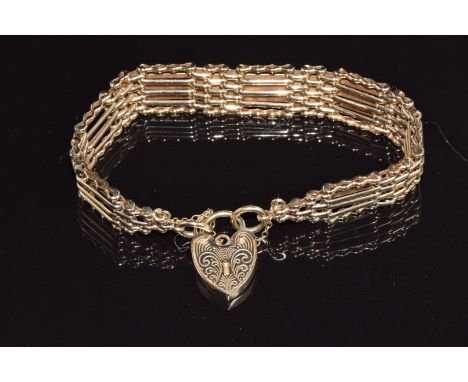 A 9ct gold gate bracelet with heart padlock, 24.9g&nbsp;