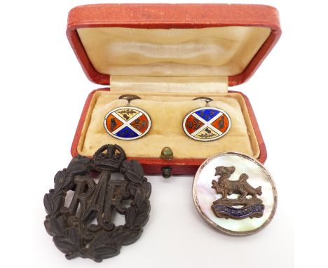 A pair of silver cufflinks set with enamel, an RAF brooch, and an RAF badge&nbsp;