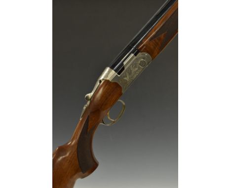 Beretta Ultra Light 12 bore over and under ejector shotgun with engraved scenes of birds to the locks and underside, scrollin