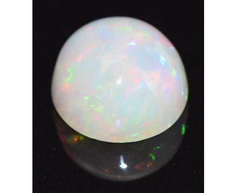 A loose round opal cabochon measuring 2.80ct