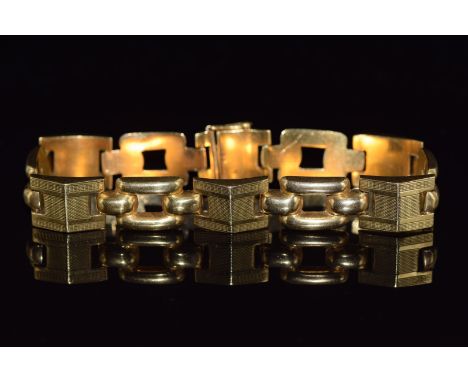 An 18ct gold bracelet made up of square buckle links and engine turned links, 33g&nbsp;