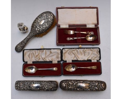 Two cased hallmarked silver teaspoons, cased hallmarked silver fork and spoon, hallmarked silver pepper and a three piece hal