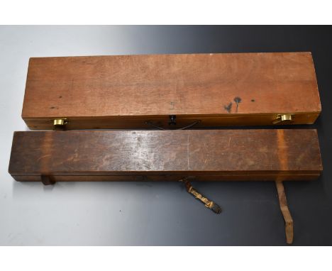 Two vintage wooden gun cases, both with fitted interiors, largest 105x26x10cm.&nbsp;
