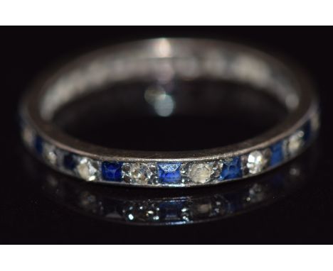 A c1920 eternity ring set with alternating sapphires and diamonds, 1.1g,&nbsp;size K