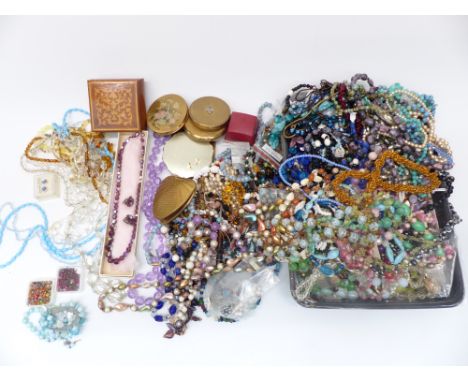 A collection of costume jewellery including vintage necklaces, beads, enamel buckle, enamel pot, vintage beads, etc&nbsp;