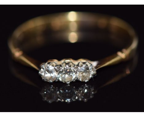 An 18ct gold ring set with three diamonds, 1.8g,&nbsp;size Q/R