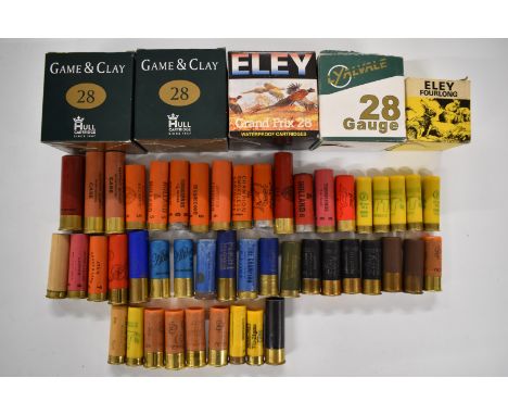 A collection of 28, 12 bore and .410 shotgun cartridges together with various primed empty cases, some in original boxes.&nbs