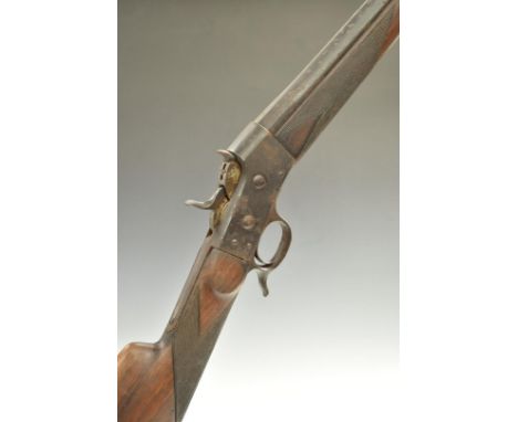 Belgian 28 bore Remington rolling block rifle with chequered grip and forend, sling suspension mounts, spurred trigger guard 