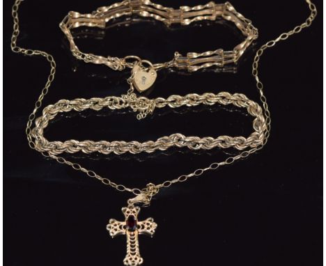 A 9ct gold gate bracelet, 9ct gold rope twist bracelet and chain and 9ct gold cross pendant set with a garnet, 11.2g