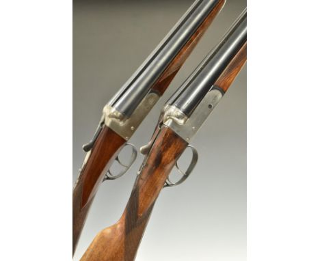 Two Spanish 12 bore side by side shotguns, one Master with chequered grip and forend, double trigger and 27.75 inch barrels, 