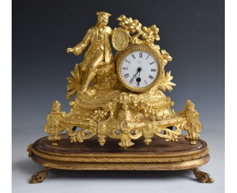 19thC French figural mantel clock featuring a seated artist, the 8cm enamelled dial marked Jay Paris, with Breguet style hand