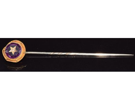 Victorian stick pin set with an amethyst with a seed pearl inset to the centre&nbsp;