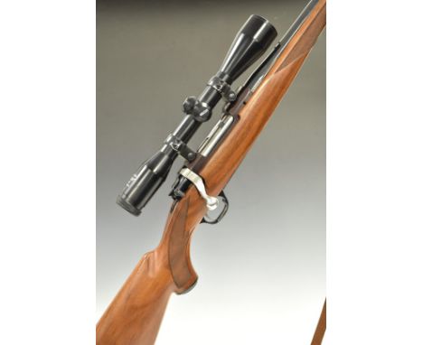 Ruger M77 Mk II .243 bolt-action rifle with chequered semi-pistol grip and forend, Hush Stalker sling mounts, embossed leathe