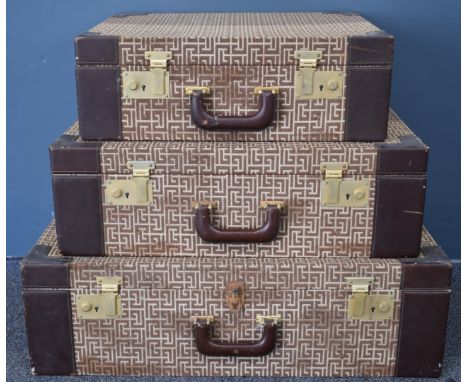 Vintage&nbsp;Pierre Balmain designer set of three graduated suitcases, the largest W71 x D46 x H21cm