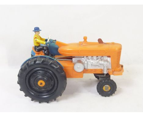1960's plastic "Tricky Tommy" battery operated tractor, 27cm long.