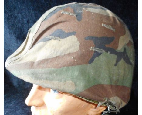 U.S. Army helmet. Vietnam War period. With camo cover and insert.