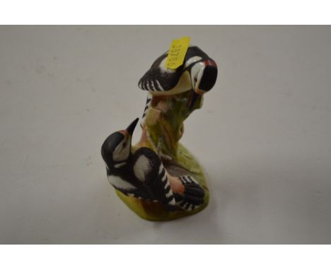 A Royal Worcester bird ornament "Pied Woodpeckers"