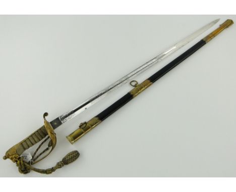 A naval Officer's sword
complete with scabbard, Bullion sword knot, and outer leather carrying case.