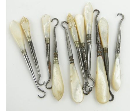 11 button hooks
with mother of pearl handles, longest 4.25".
