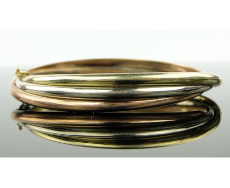 A 9ct 3 colour gold hinged bangle,
19g.