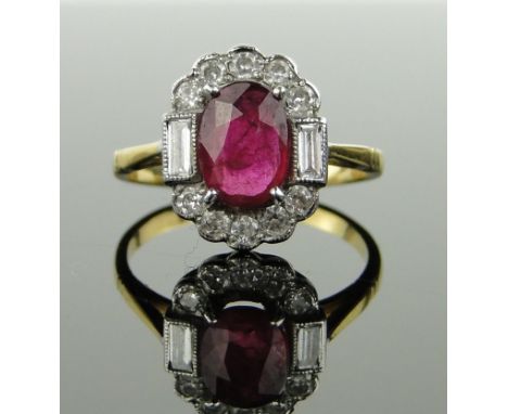 18ct gold ruby and diamond cluster ring,
setting height 12mm, size I.