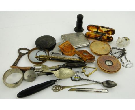 Cased pocket compass,
2.5", cigarette case and other interesting items.