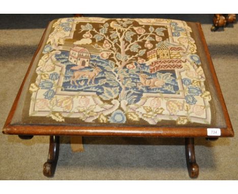 A Regency mahogany stool,
with tapestry seat and cross stretchers.