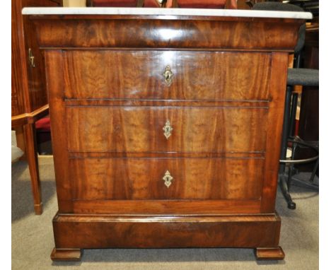 A 19th century Continental mahogany commode,
having a grey and white marble top and 3 drawers under, on bracket feet, width 2