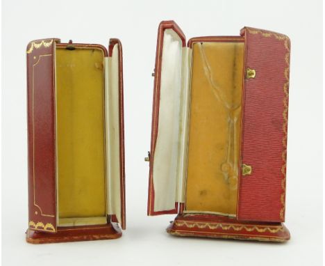 A Vintage Cartier gilded red leather jewellery box,
height 20cm and a similar leather jewel box probably Cartier, (2).