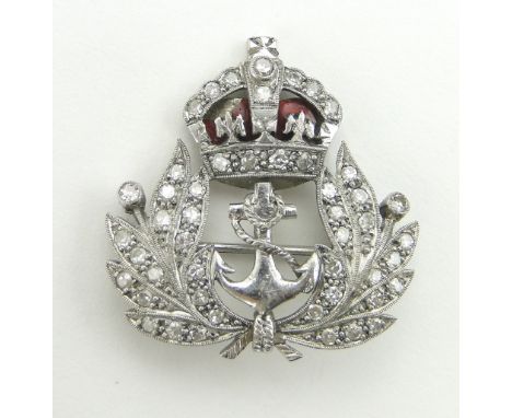 A platinum, diamond and enamel naval sweetheart brooch,
width 25mm, 6g.