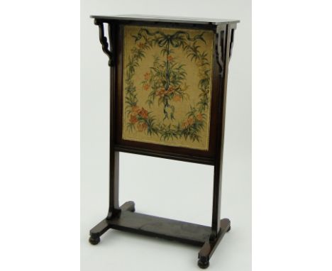 A Victorian mahogany metamorphic double-sided firescreen/table,
height 30".