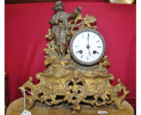 19th century continental gilt metal mantel clock,
2-train movement with white enamel dial, clock height 12".