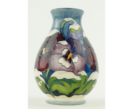 A Moorcroft "Christmas Pansy" design vase,
signed R Bishop, 5.25".